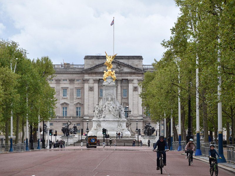Union flags along The Mall with Buckingham Palace and the Victoria Memorial at the end
